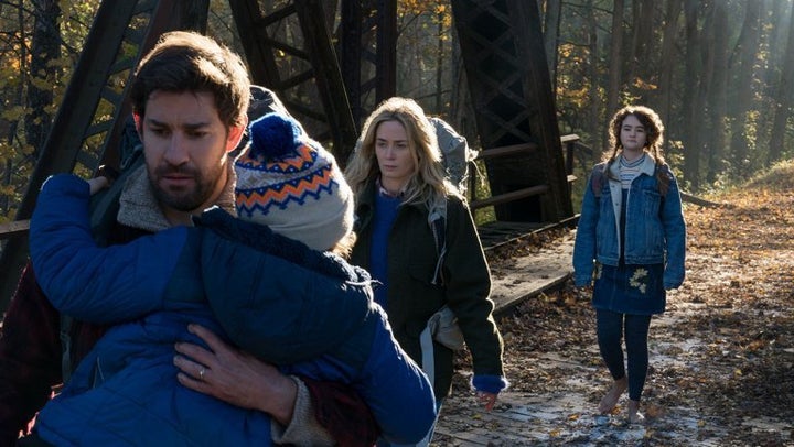 Krasinski and Blunt in “A Quiet Place” along with Millicent Simmonds and Cade Woodward, who played their children.