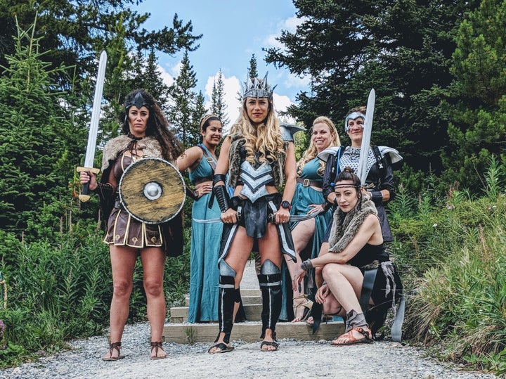 Alex Pinkerton, center, said the costumes were an ode to all the women out there who are "battling to maintain their rightful place in their environment."