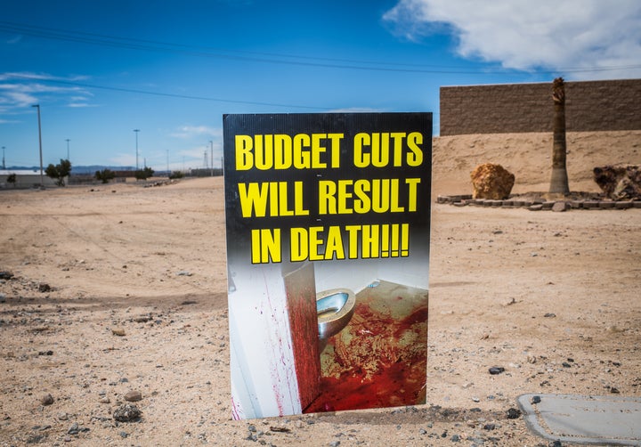 Victorville prison staffers protest the budget cuts they say are leading to unsafe conditions at the desert complex, where hundreds of migrants have been detained.