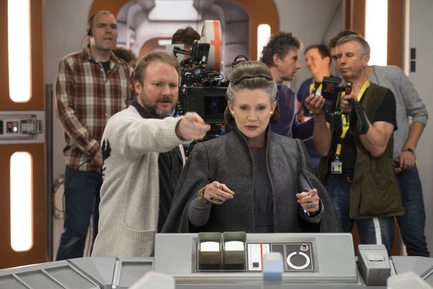 Carrie on set of 'The Last Jedi' with director Rian Johnson 