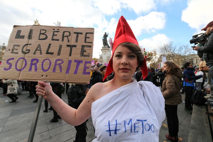 A woman protests on the International Day for the Elimination of Violence Against Women on Nov. 25, 2017, in Paris.