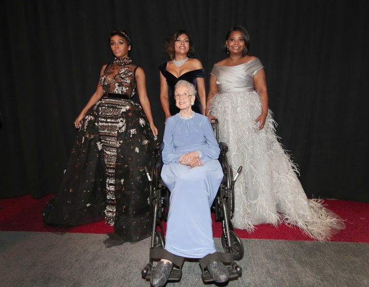 NASA mathematician Katherine Johnson and actors Taraji P. Henson, Octavia Spencer and Janelle Monae pose backstage during the