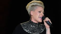 Pink Defends Family Beach Pictures After Postponing Concert Due To Sickness