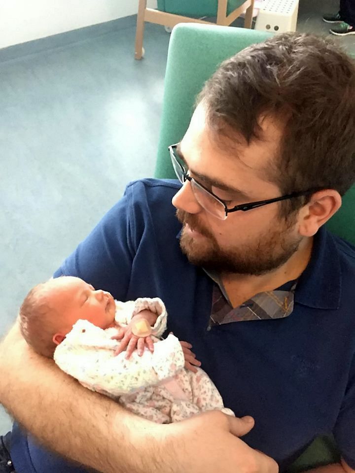 Emilie with dad Richard Cox in hospital.