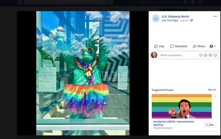 The small Statue of Liberty at the back entrance of the U.S. Embassy in Berlin, wearing a rainbow skirt.