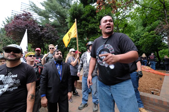 Tusitala "Tiny" Toese (front), a member of both Proud Boys and Patriot Prayer, addresses supporters after fighting broke out between anti-fascist counterprotesters on June 3 in Portland, Oregon.