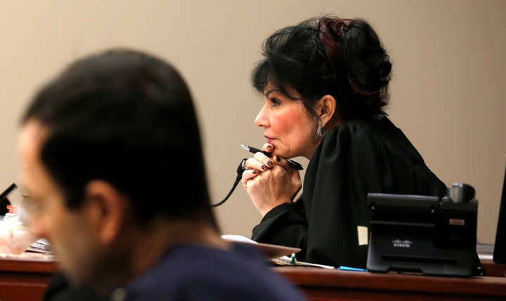 Larry Nassar and Judge Rosemarie Aquilina during his sentence hearing on Jan. 24 in Lansing, Michigan. She denied a motion to