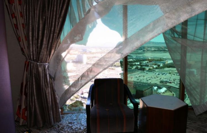 A broken window is seen in Stephen Paddock's room at the Mandalay Bay hotel.