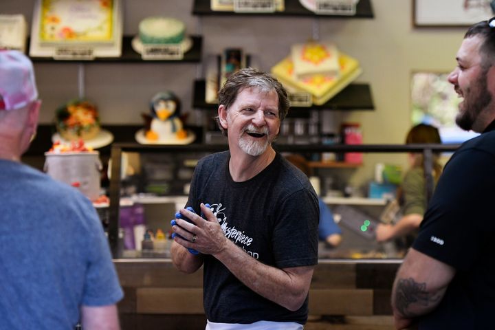 Baker Jack Phillips, owner of Masterpiece Cakeshop, accepts congratulations and thanks in his Colorado shop after the U.S. Supreme Court voted 7-2 in his favor.
