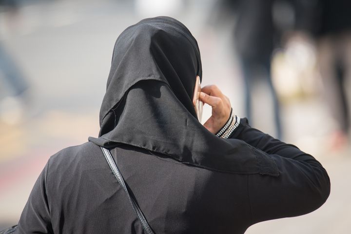 A woman has become the first person in Denmark to be fined for wearing a face veil.