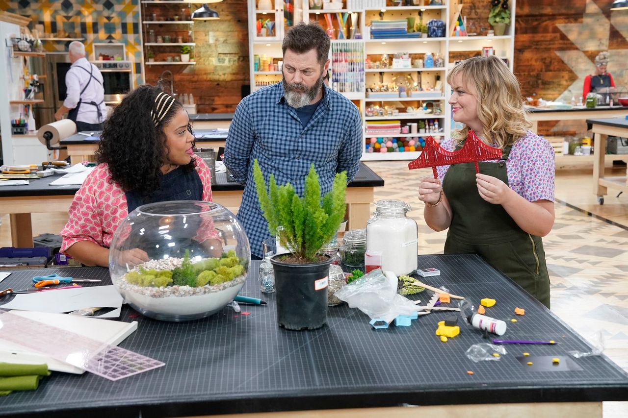 "Making It" co-hosts Nick Offerman (center) and Amy Poehler (right) talk to competitor Amber Kemp-Gerstel (left) in the show's second episode, airing Tuesday.