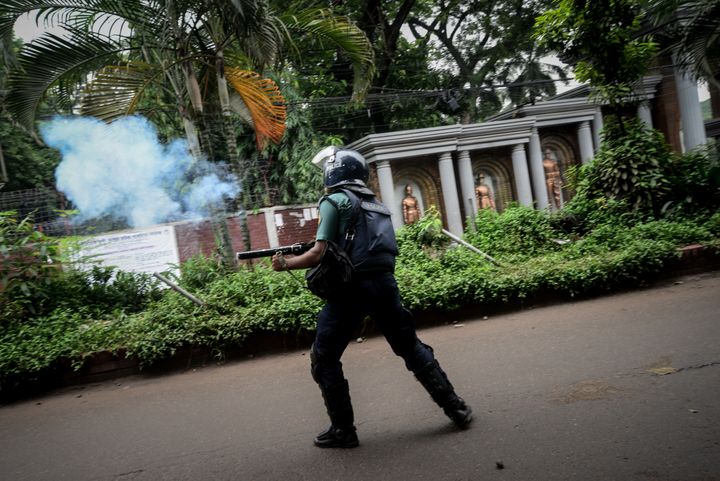 Bangladeshi police clash with students in Dhaka on Sunday over the city's unsafe driving conditions. Unlicensed drivers, unregistered vehicles and speeding buses are commonplace, police corruption is rife and traffic enforcement often nonexistent.