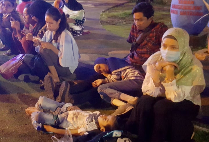 Residents spent the night on the town square in Mataram following the quake.