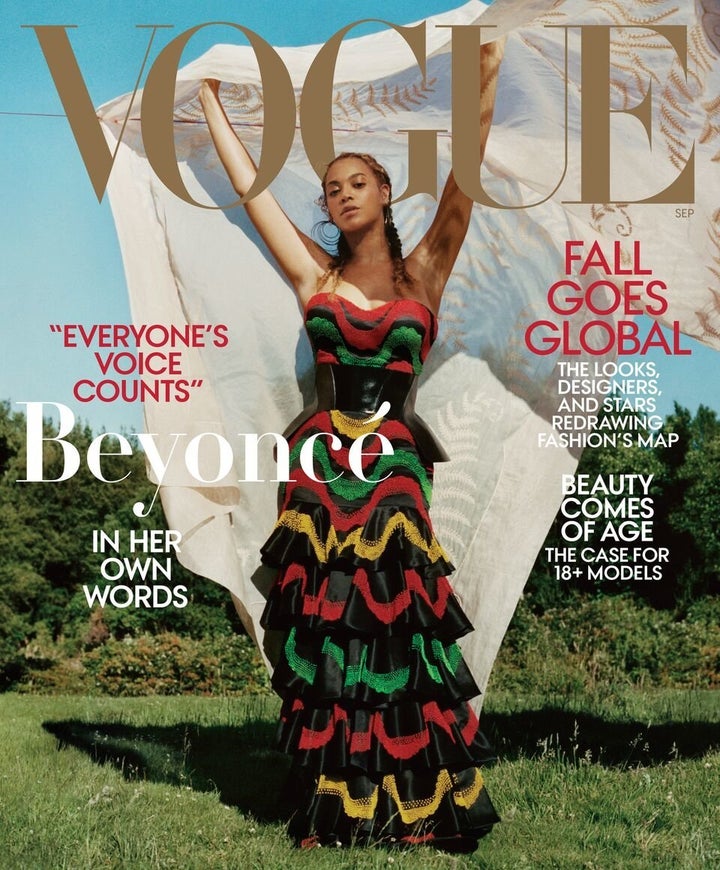 For Beyoncé's second cover, she wears a dress and corset by Alexander McQueen with Lynn Ban earrings, Vogue says. 