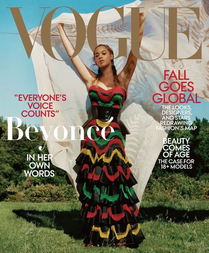 For Beyoncé's second cover, she wears a dress and corset by Alexander McQueen with Lynn Ban earrings, Vogue says.