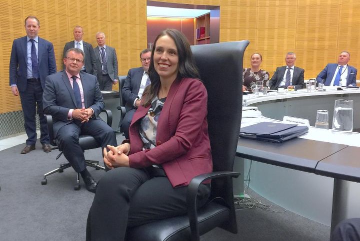 Jacinda Ardern poses for photographs during her first cabinet meeting since giving birth.