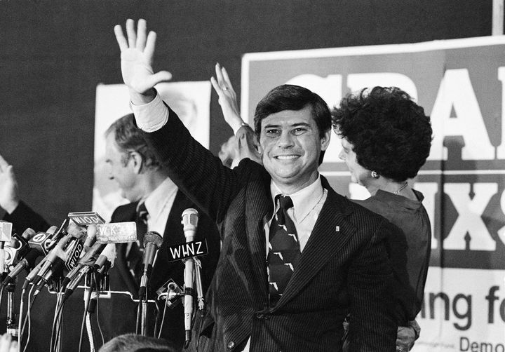 Florida governor-elect, Democrat Bob Graham, gives a victory wave at a celebration in Miami, Nov. 8, 1978. Behind him is his wife, Adele.