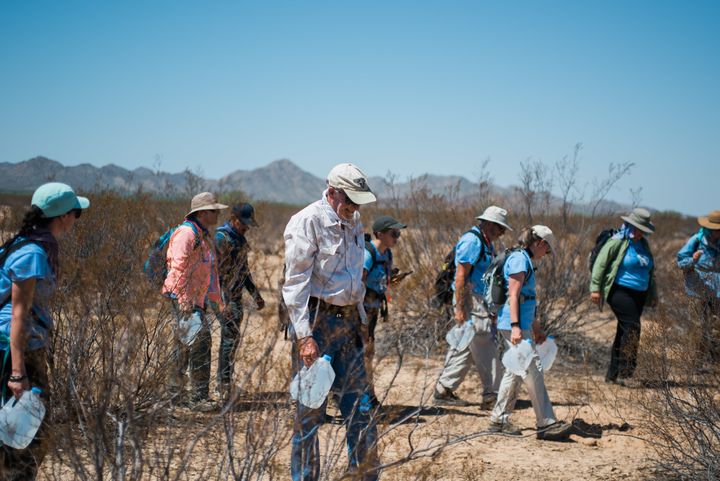 Clergy members and activists with the migrant aid group No More Deaths hike into the Cabeza Prieta National Wildlife Refuge on August 5, 2018.