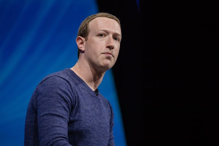 Holocaust experts have demanded a meeting with Facebook founder Mark Zuckerberg