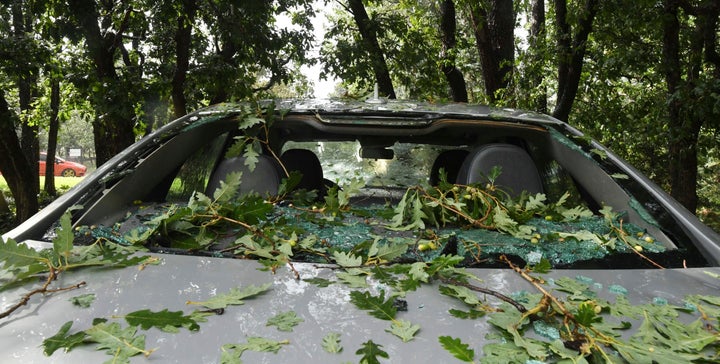 The back window of a car that was smashed by hail on Monday in the Broadmoor area of Colorado Springs is seen.
