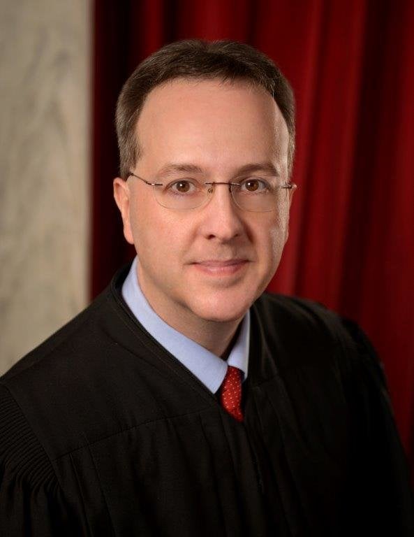 Justice Allen Loughry was suspended without pay in June after being indicted by a federal grand jury on nearly two dozen fede