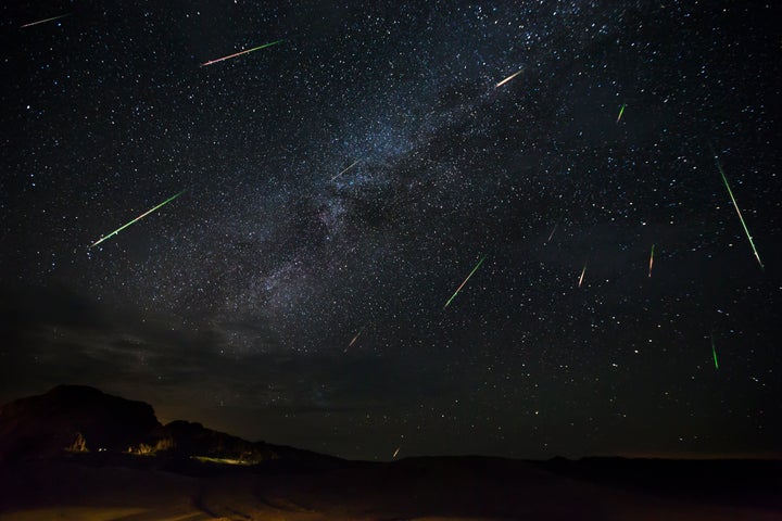 Jason Weingart captures meteors of the Perseid meteorshower as they dart across the night sky, on Aug. 14, 2016, in Terlingua