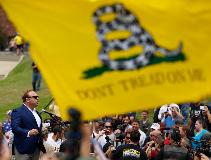 Alex Jones from Infowars.com speaks during a rally in support of Republican presidential candidate Donald Trump near the Repu