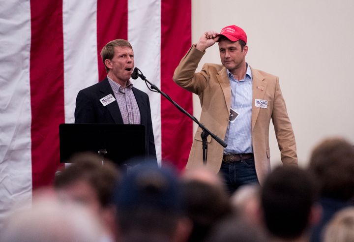Paul Nehlen, right, is introduced at a "Drain the Swamp" campaign rally for Alabama Republican Senate candidate Roy Moore last December. Moore lost the special election that month; Nehlen lost his bid for a House seat in Wisconsin on Tuesday.