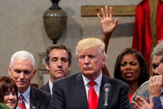 Omarosa Manigault pictured behind Donald Trump in 2016.