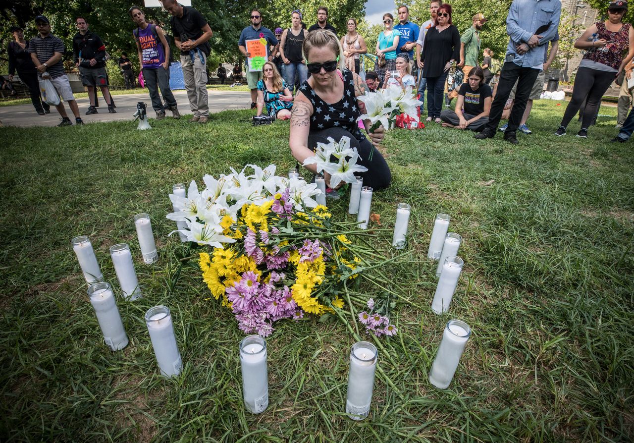 A vigil is held in Charlottesville's McGuffey Park for the victim killed by a car following the Unite the Right rally on Aug. 12, 2017.