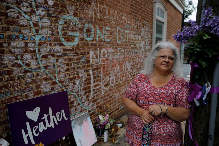 Susan Bro, mother of Heather Heyer, who was killed during the August 2017 white nationalist rally in Charlottesville, stands at the memorial at the site where her daughter was killed in Charlottesville, Virginia, U.S., July 31, 2018