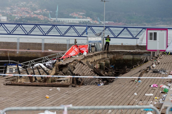 <strong>The wooden platform in Vigo suddenly collapsed as crowds watched a rap artist perform on Sunday night </strong>