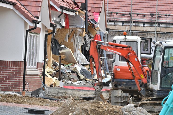Damaged properties in a row of newly-built retirement homes in Ermine Street, Buntingford.