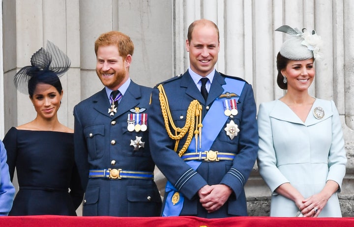 The Duke and Duchess of Sussex stand alongside the Duke and Duchess of Cambridge on the balcony of Buckingham Palace on July 10. 