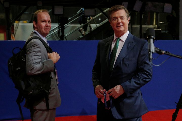 Rick Gates (left) and Paul Manafort, seen on the floor of the Republican National Convention in July 2016. A jury is deliberating Manafort's fate in his tax and bank fraud trial.
