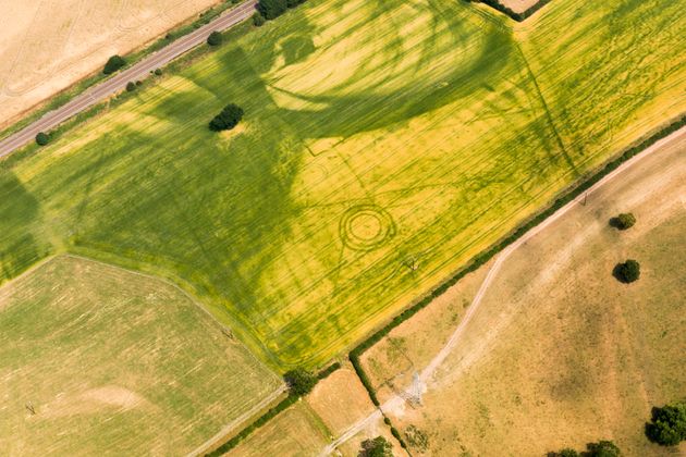 The stripes and pits are usually remnants of Iron Age land boundaries.