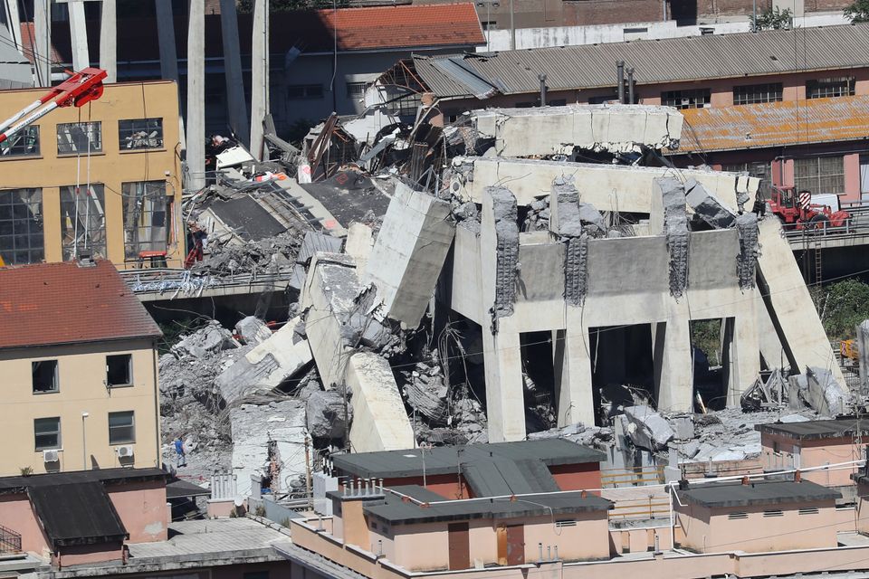 Rescuers search through rubble on Wednesday.