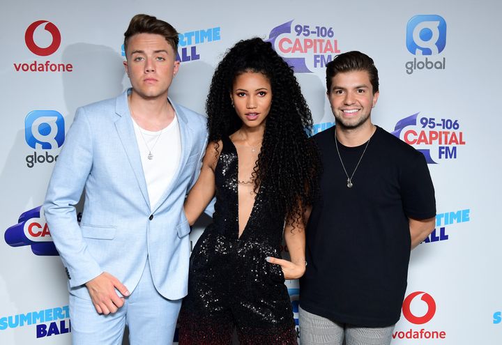 Vick with her Capital radio co-hosts Roman Kemp and Sonny Jay