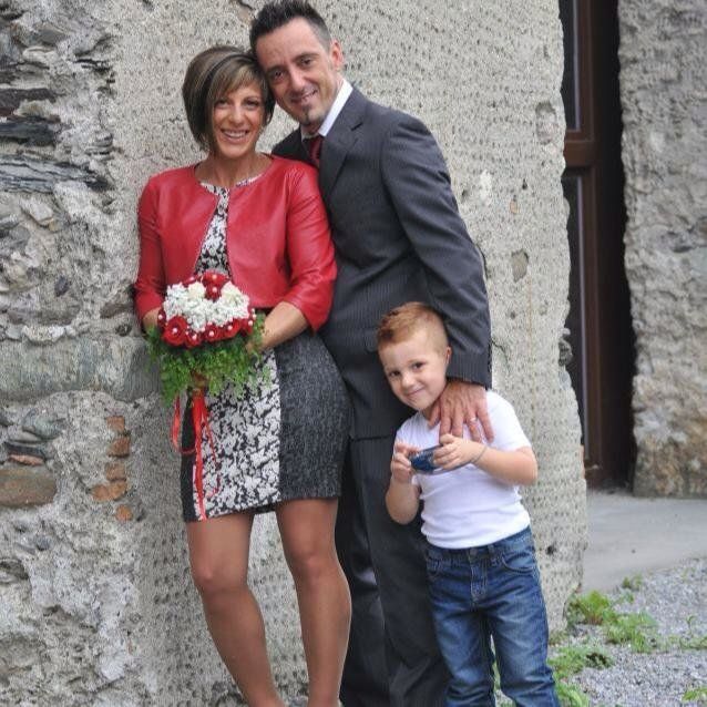 Roberto Robbiano and Ersilia Piccinino, pictured on their 2014 wedding day with their son Samuele