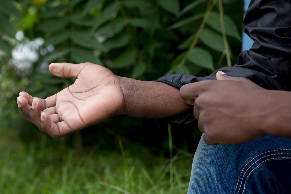 Jones talks about the cuts he received from handcuffs that have since healed as he and his mother, Tillana Jones, 38, tell th