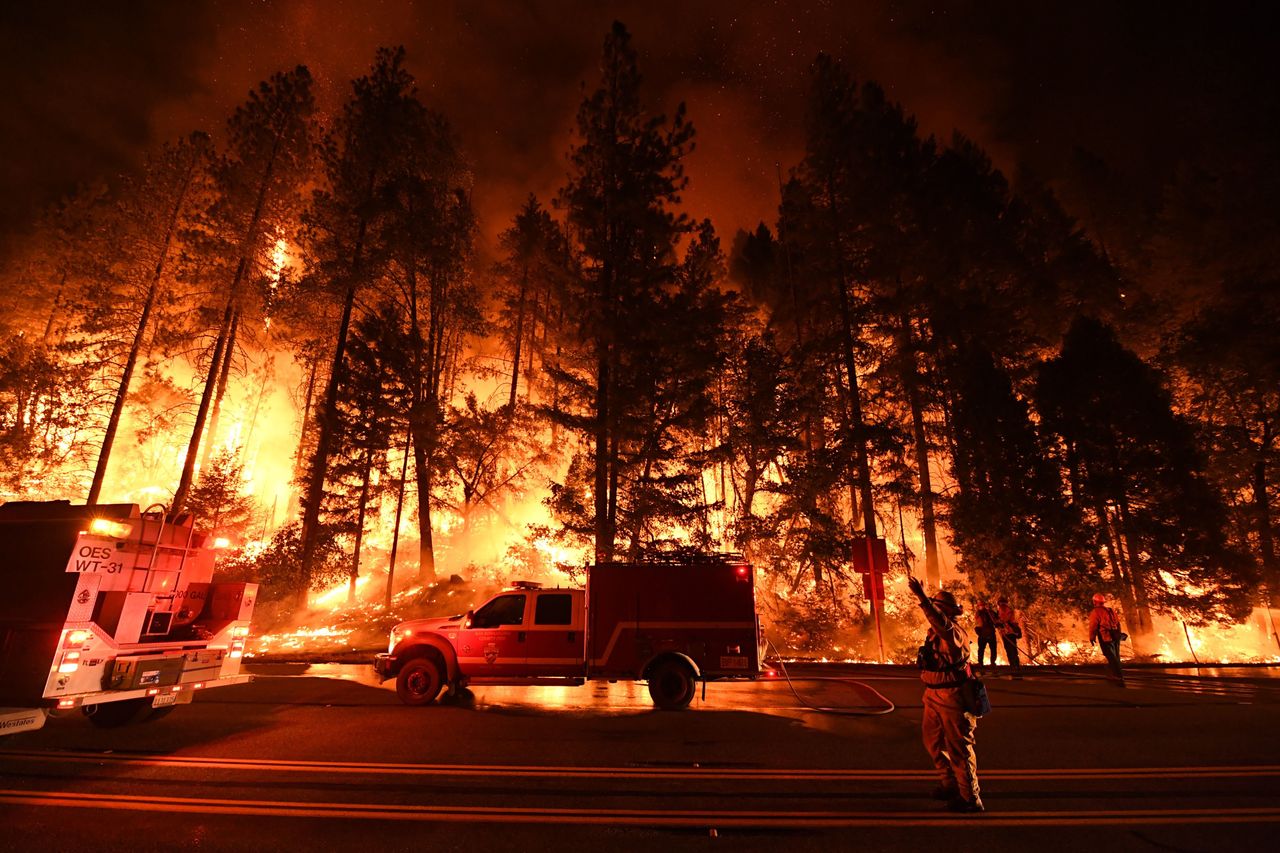 Firefighters battle the Carr fire near Redding, California, on July 31.