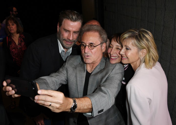 Didi Conn, Randal Kleiser, Olivia Newton-John, John Travolta and Barry Pearl pose for a selfie.