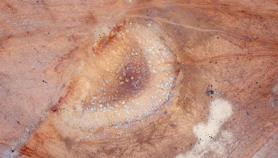 A dried-up dam can be seen on one patch of land in north-western New South Wales.