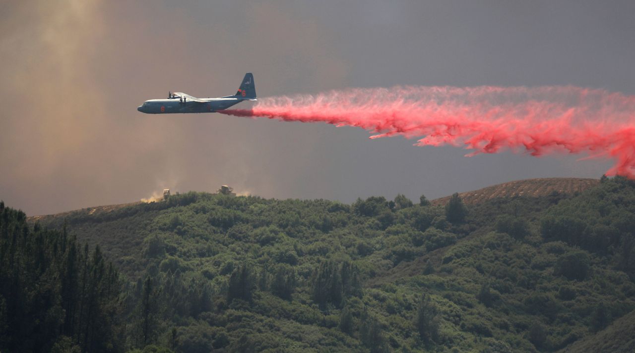 A tanker drops fire retardant on the fire near Lakeport, California, on 1 August.
