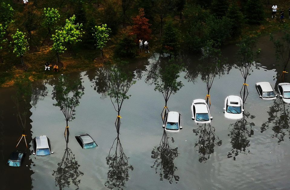 Cars were nearly fully submerged in Shenyang in 7 August.