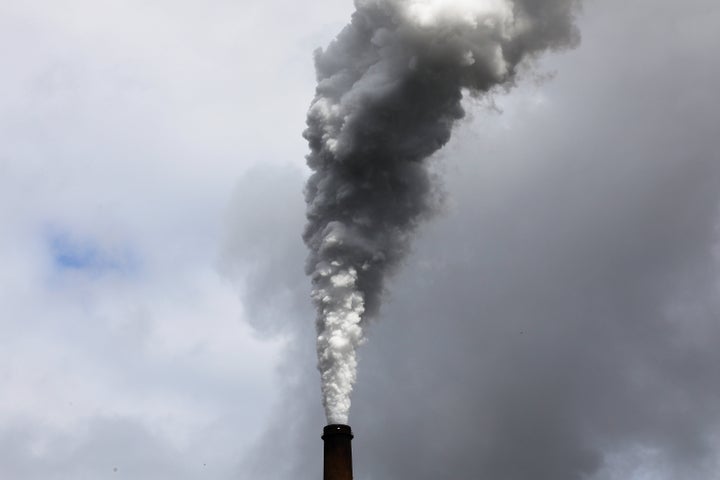 Exhaust spews from the East Bend Generating Station, a coal-fired power plant in Union, Kentucky.