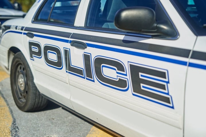 The police were called on a high school student who refused to remove his bandana.