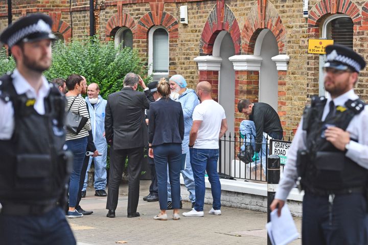 Detectives outside a property on Grayshott Road in Battersea, south-west London