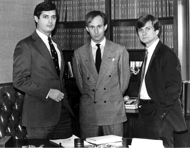 Paul Manafort (left) and Roger Stone (center) pictured with Lee Atwater (right), the newest hire for their firm Black, Manafort and Stone in 1986.