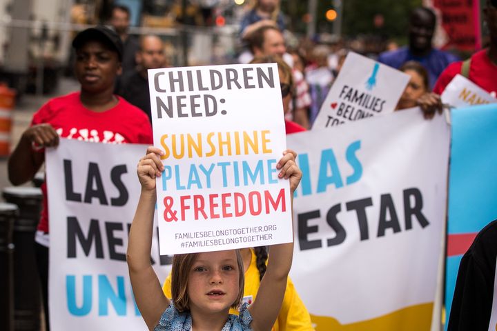 Demonstrators protest against the Trump administration's immigration policies, which resulted in more than 2,500 children being separated from their parents.